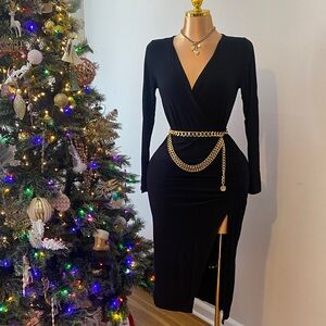 Elegant Black Wrap Dress with Gold Chain Detail